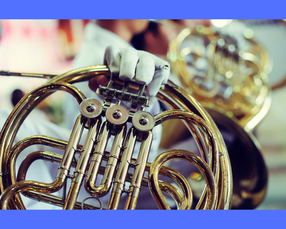 Bandmember holding horn