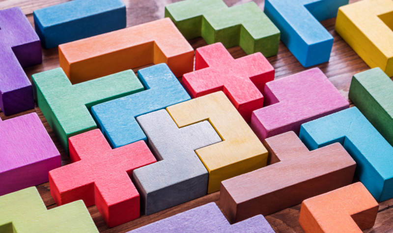 Puzzle pieces fitting together