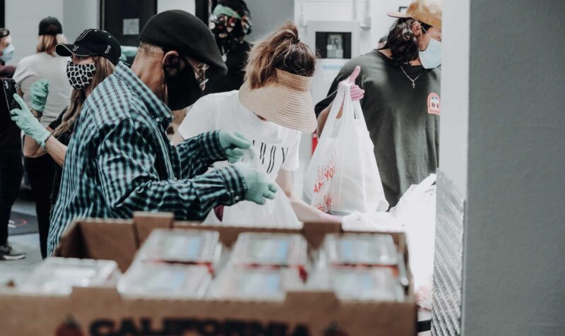 Volunteers packaging supplies