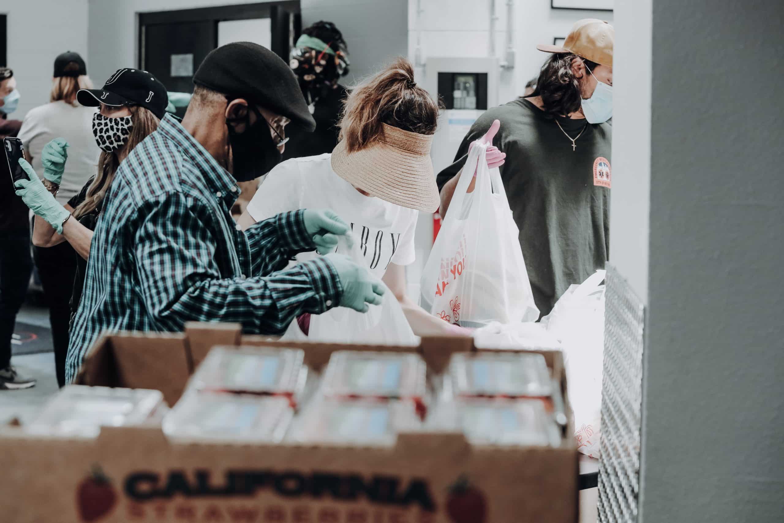 Volunteers packaging supplies